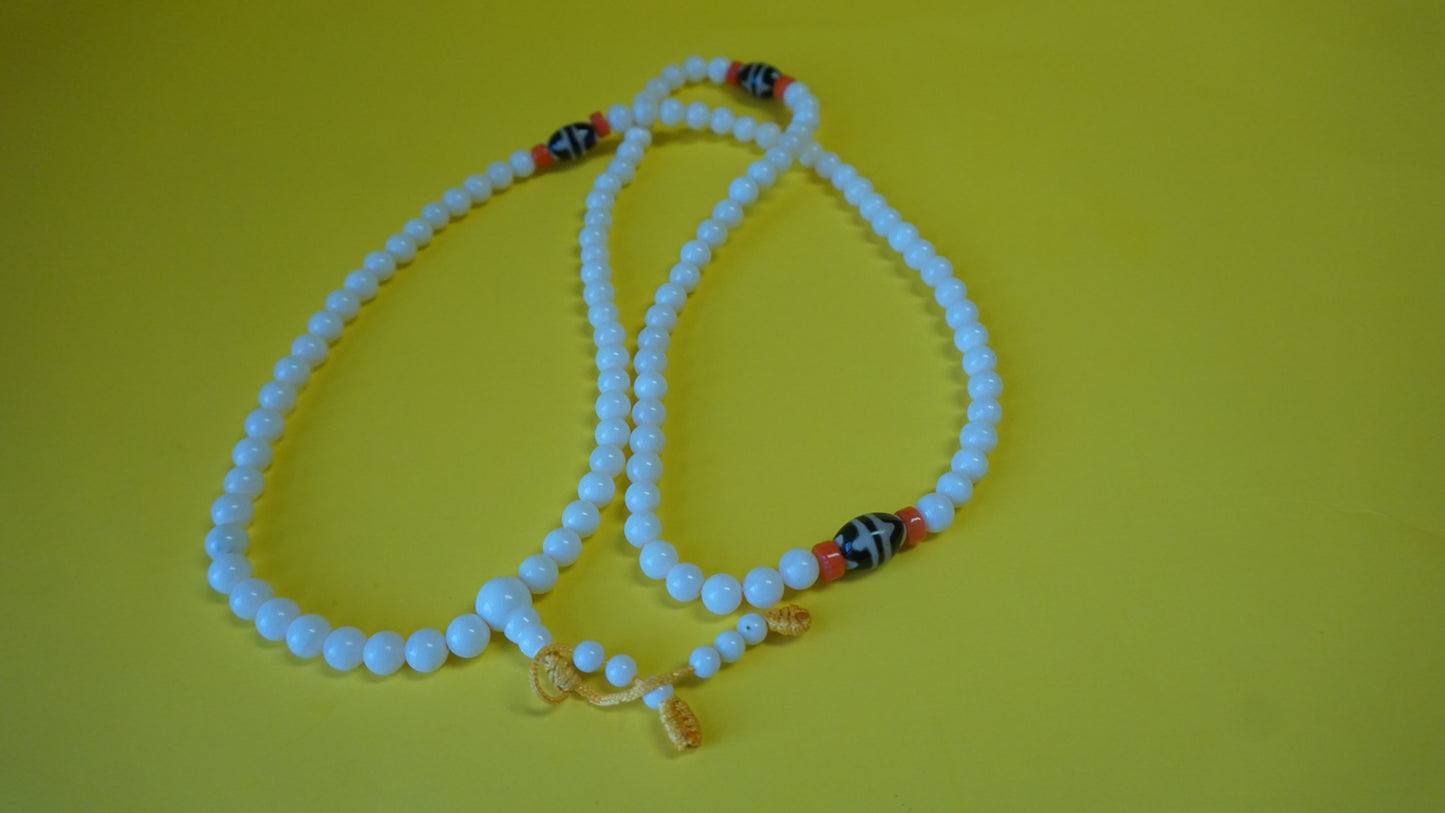 Small White Coral Smoot Bead.