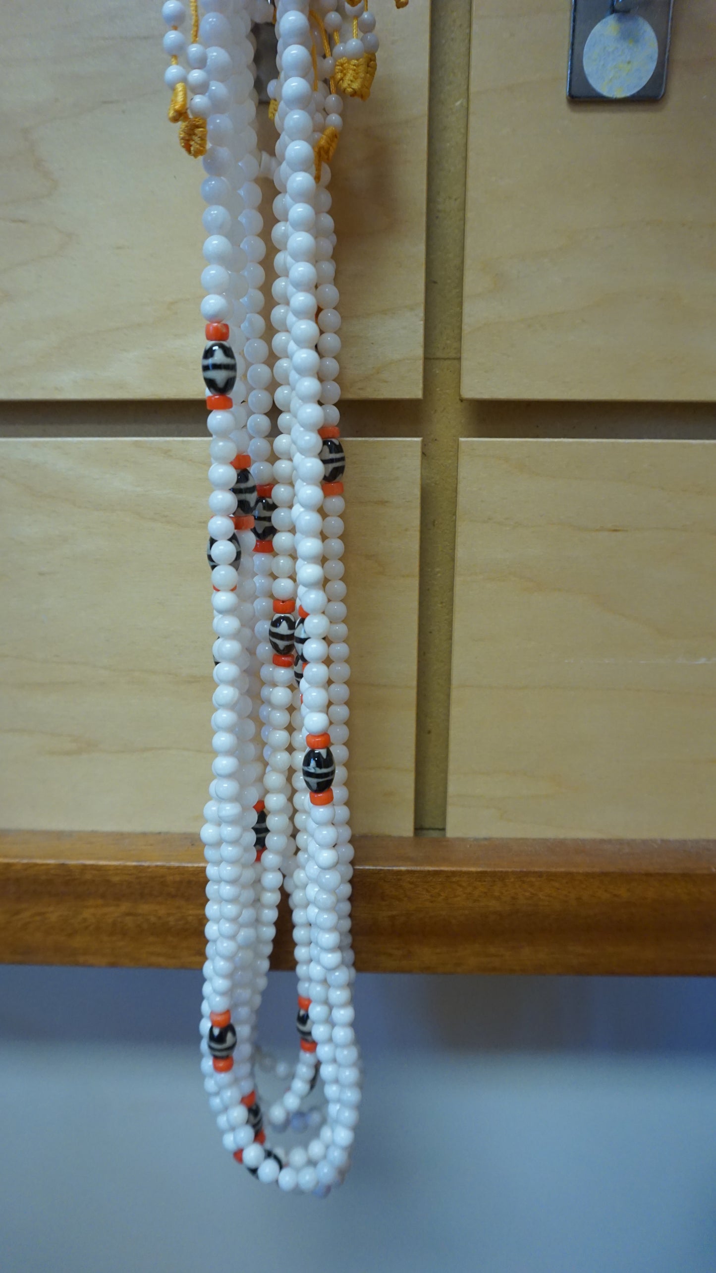 Small White Coral Smoot Bead.