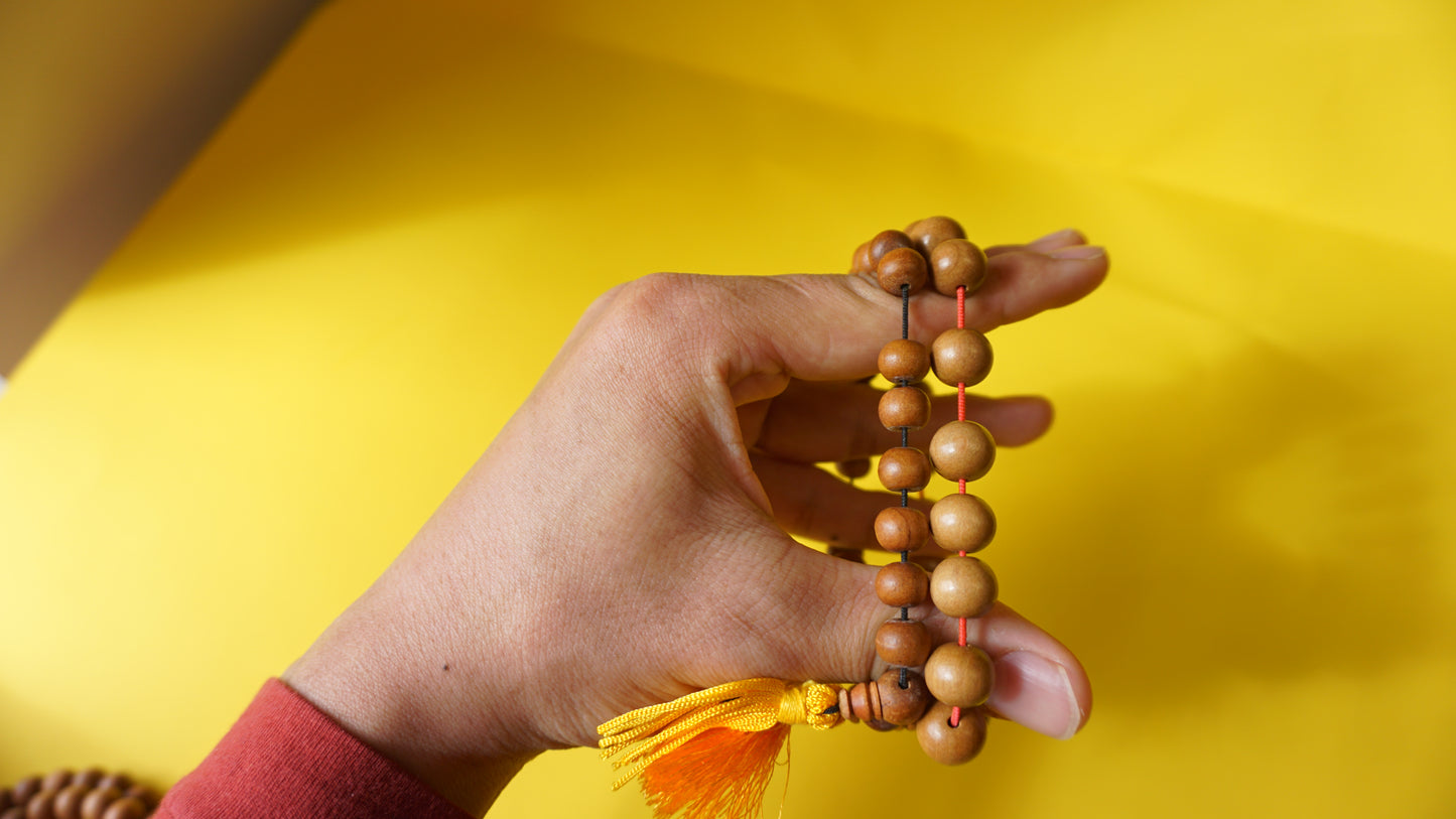 Yellow Sandelwood wrist mala.
