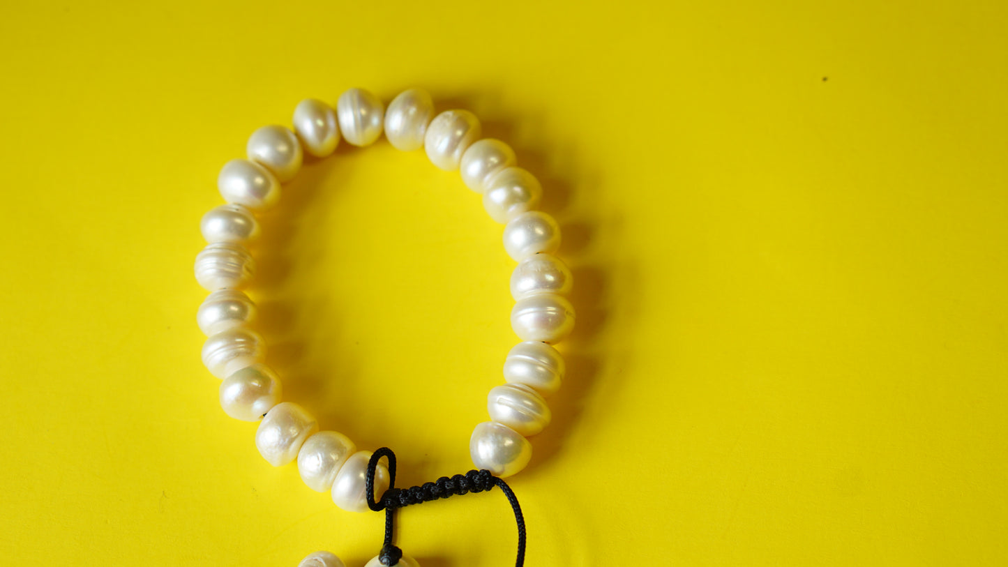 Adjustable White Bamboo Coral Smooth Round Beads.