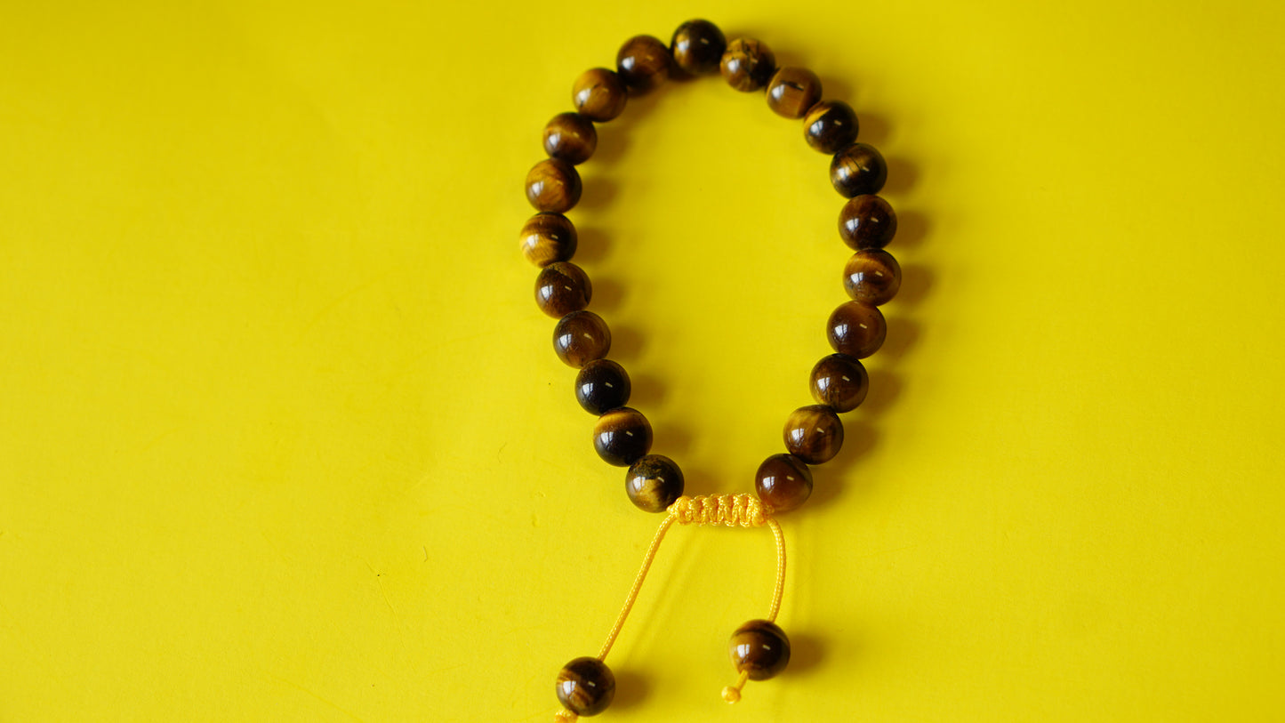 Adjustable Knotted Tiger Eye Mala.