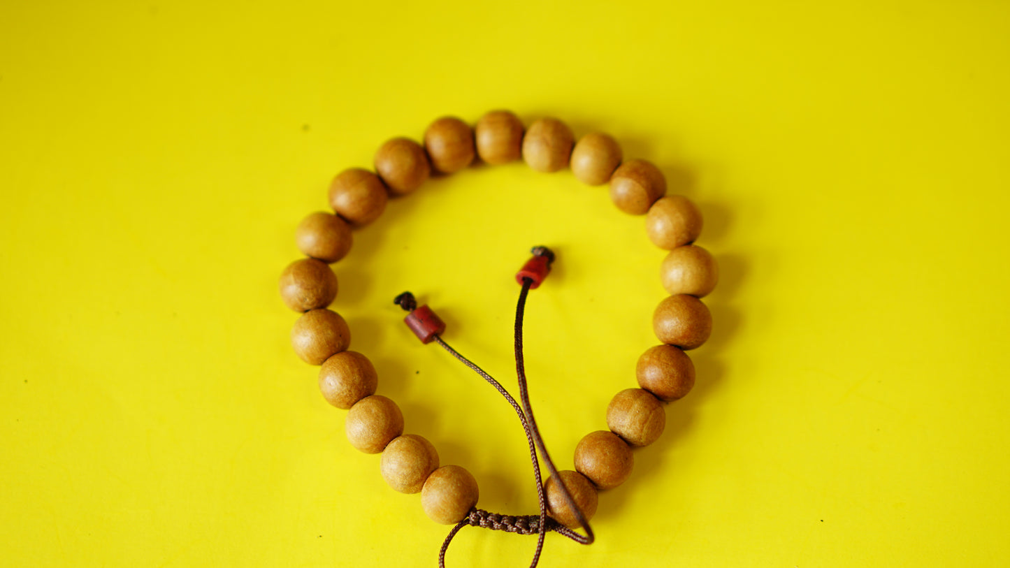 Adjustable Yellow Sandelwood Wrist Mala.