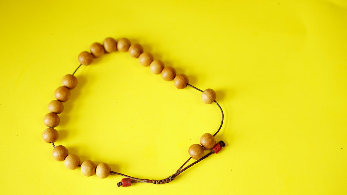 Adjustable Yellow Sandelwood Wrist Mala.