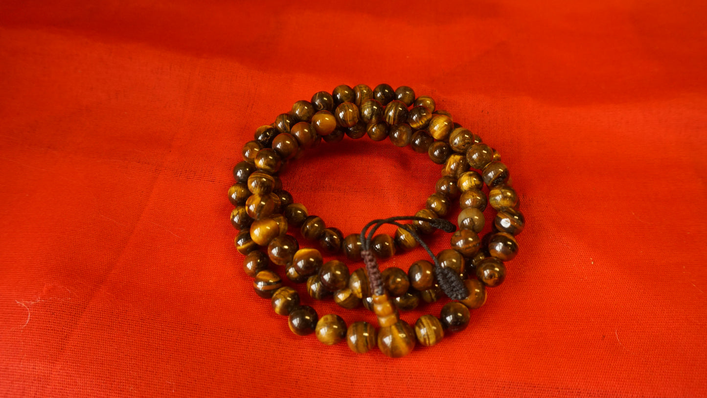 Large Light Brownish Smooth Glass Mala comes with 108 beads, hand-made from Nepal.