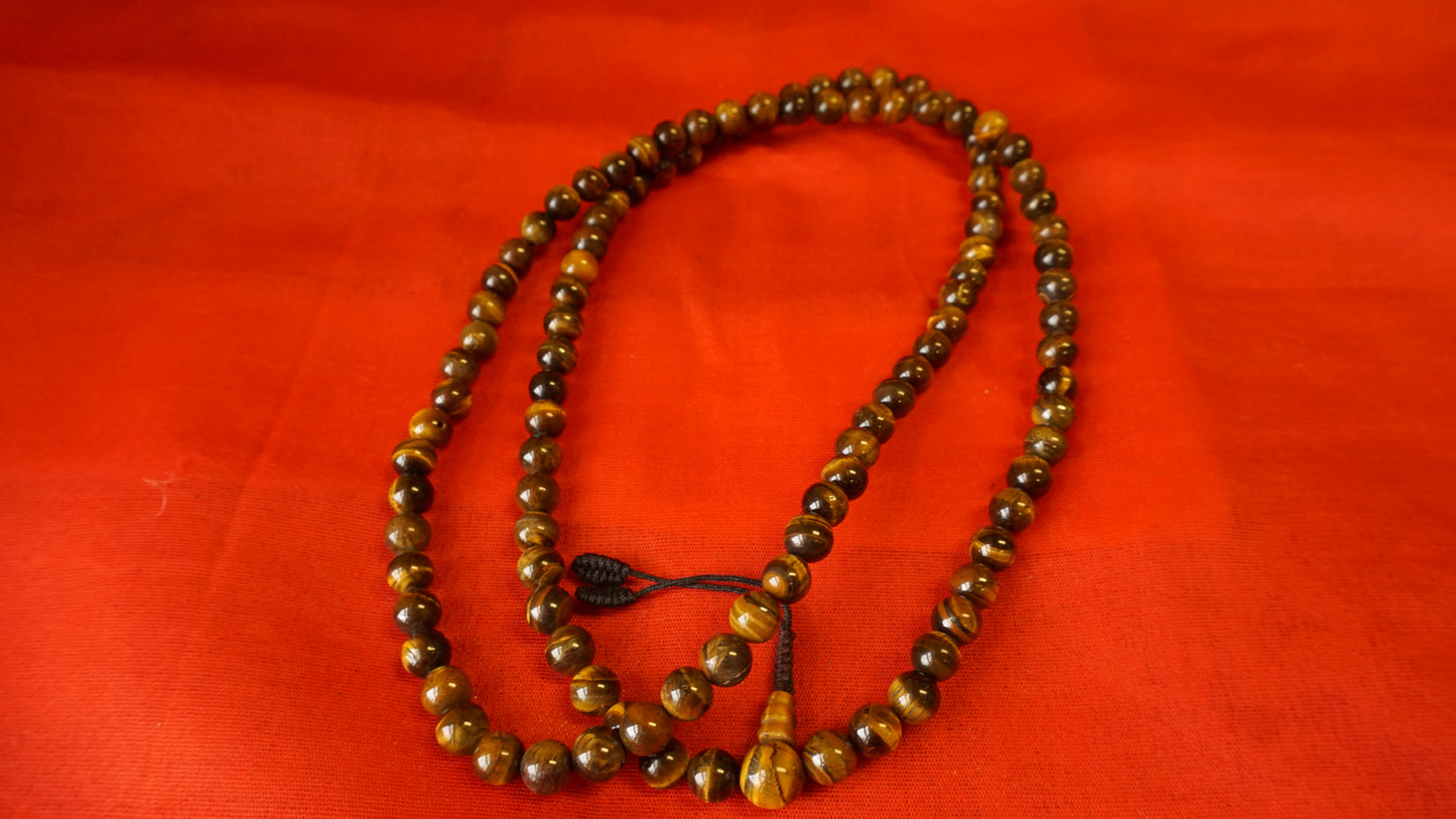 Large Light Brownish Smooth Glass Mala comes with 108 beads, hand-made from Nepal.
