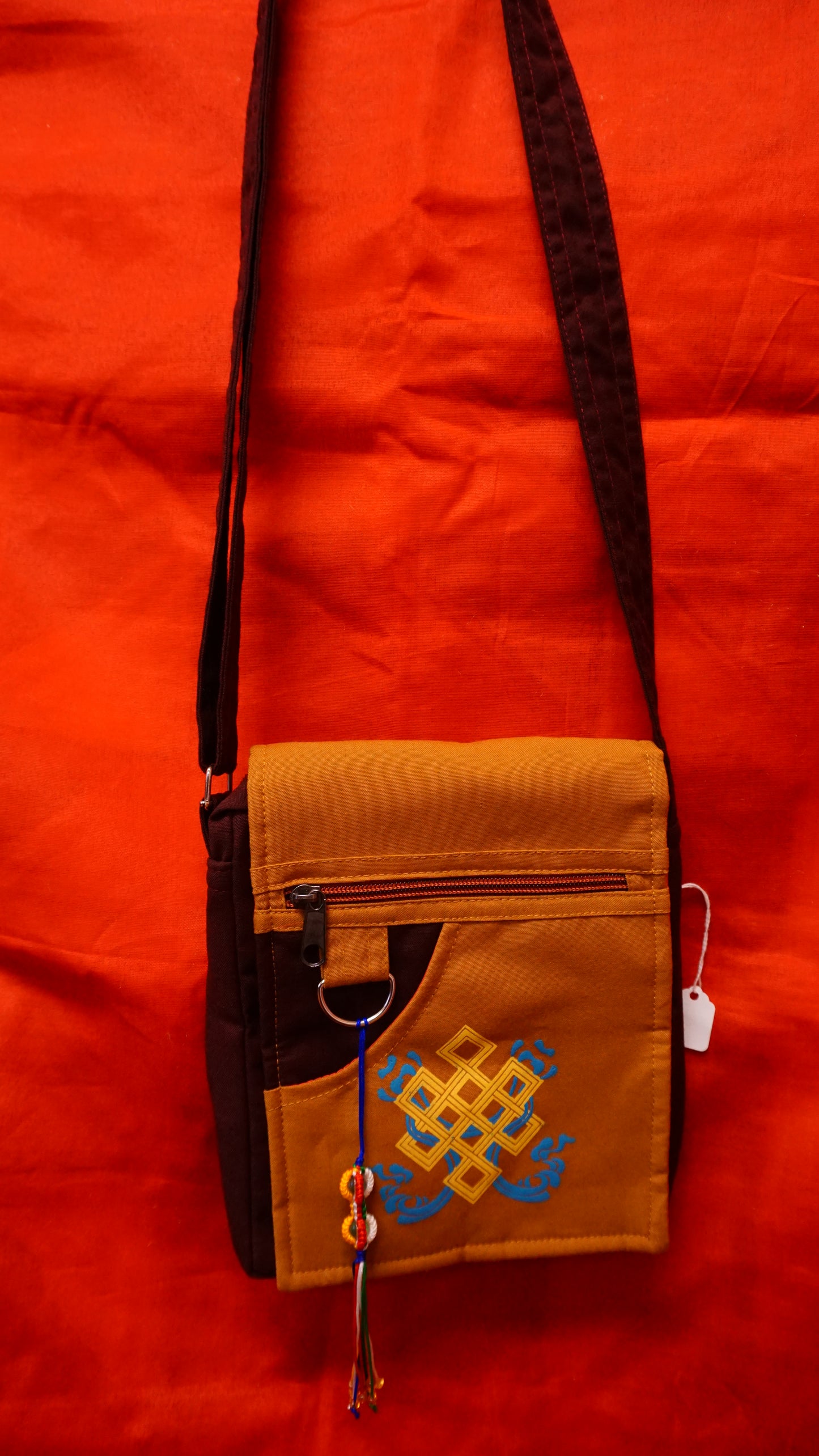 Decorated Gold and Maroon Bag.