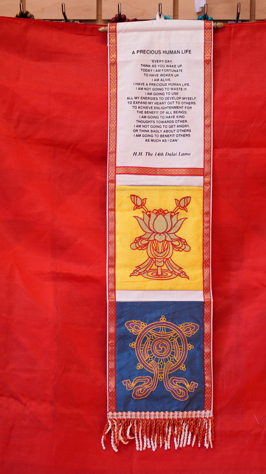 Two pocket decorative wall hanging with His Holiness the Dalai Lama's quote.